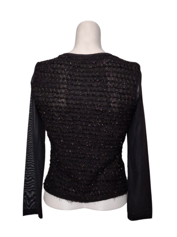 Juoda blizganti palaidinė, S